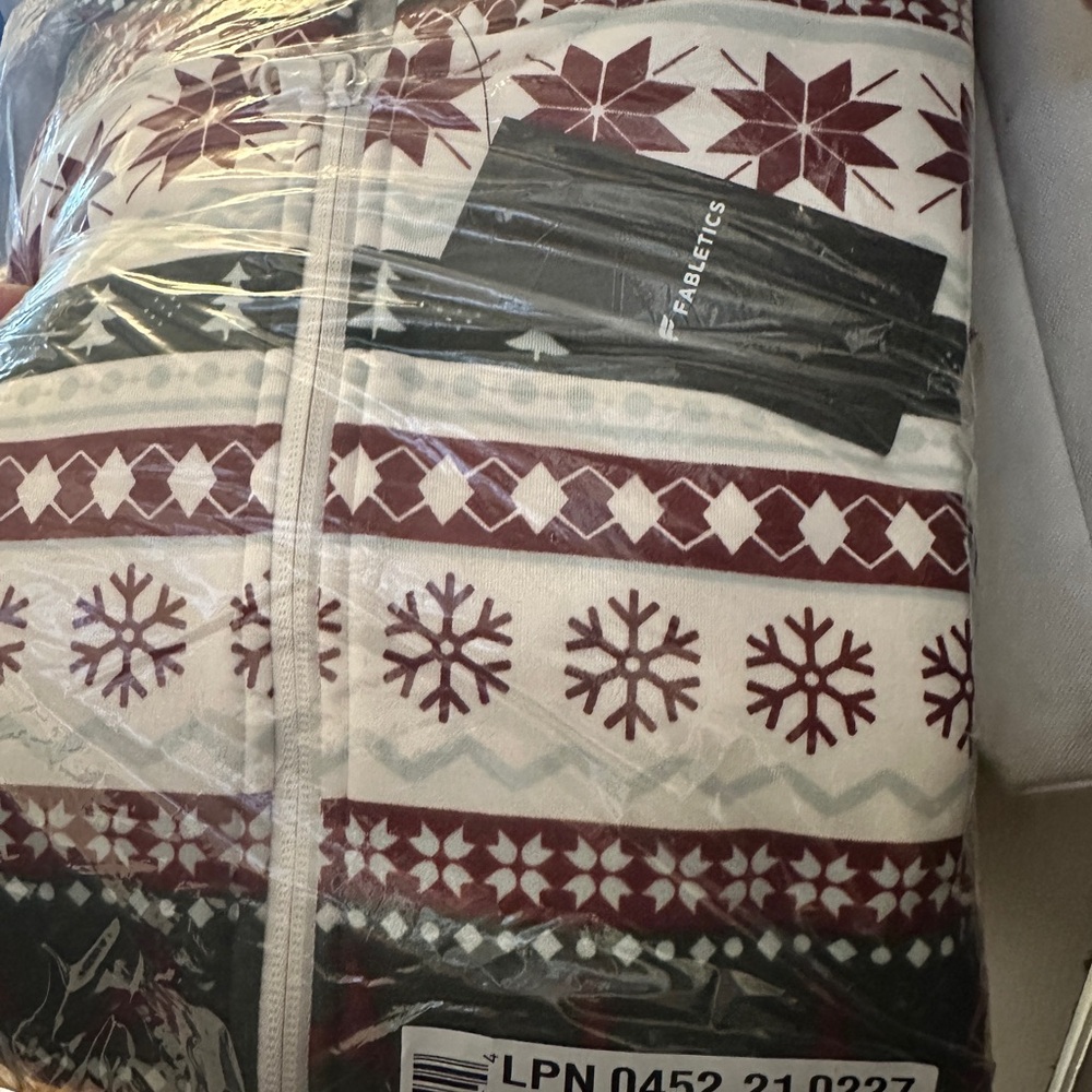 Fabletics Festive Burgundy and White Onesie. Super warm and cozy material inside